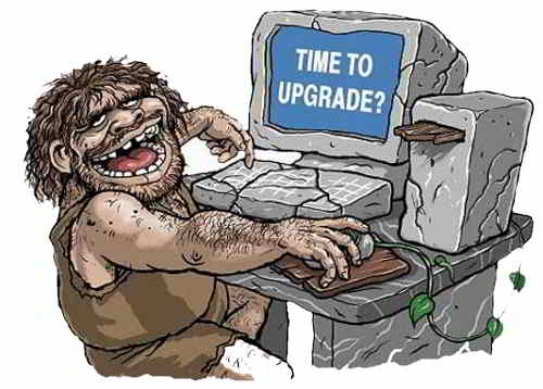 Caveman in front of a computer